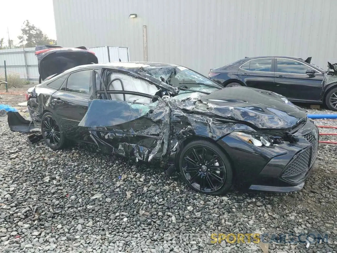 4 Photograph of a damaged car 4T1EA1AB0NU015148 TOYOTA AVALON 2022