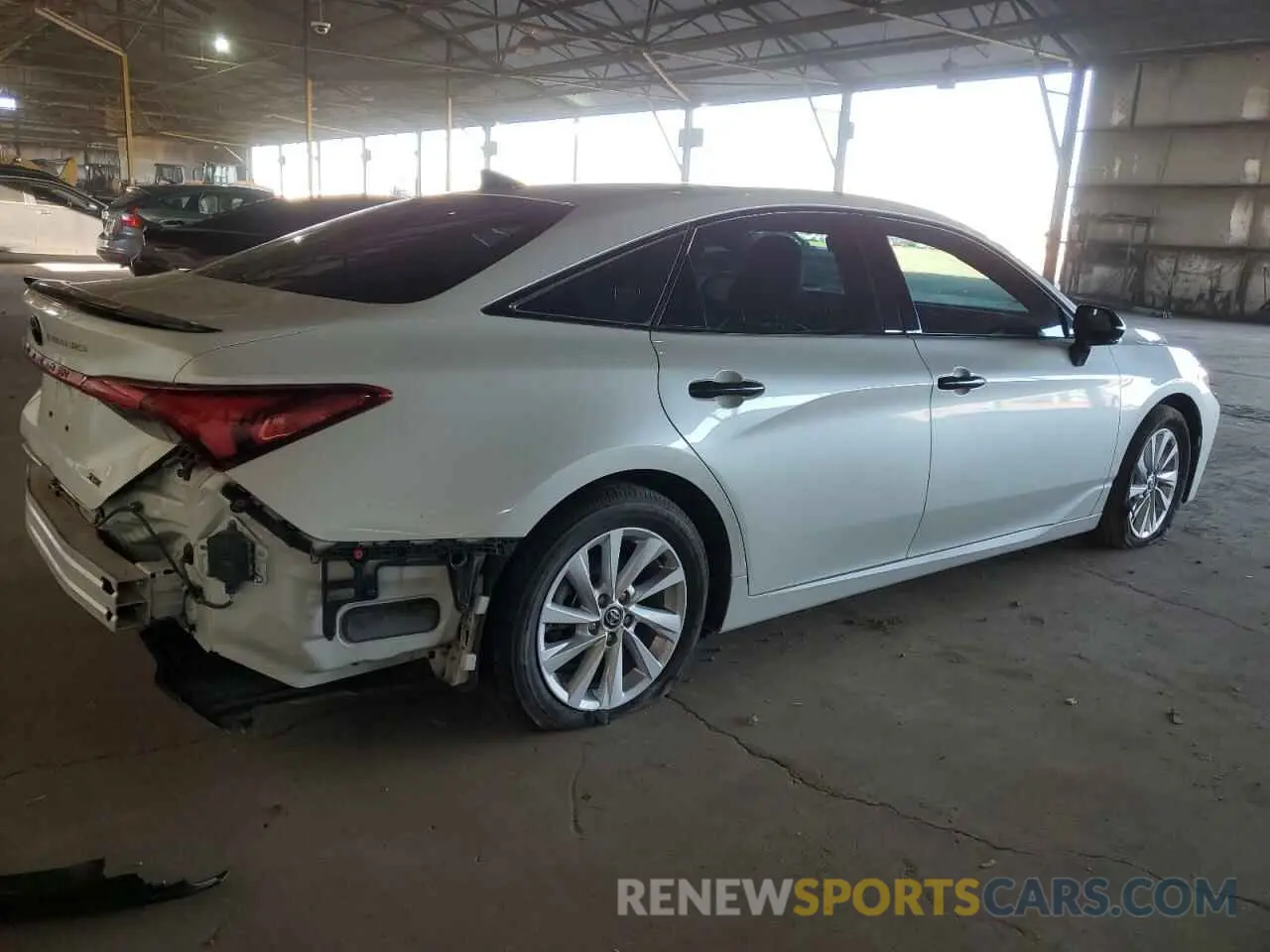 3 Photograph of a damaged car 4T1EA1AB7NU011386 TOYOTA AVALON 2022