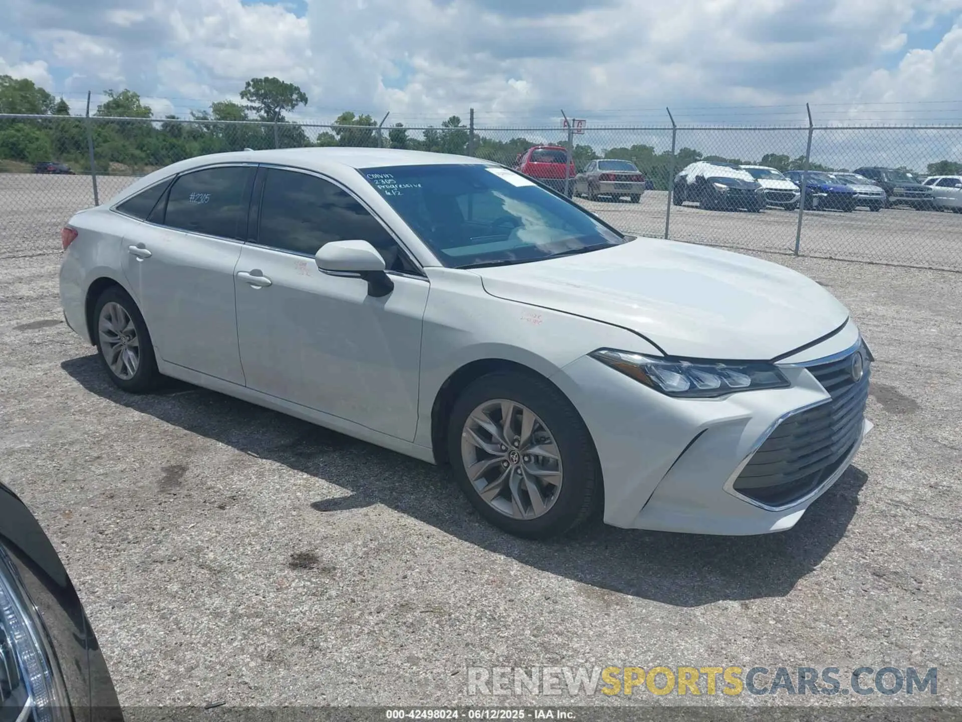 1 Photograph of a damaged car 4T1JA1AB5NU015841 TOYOTA AVALON 2022