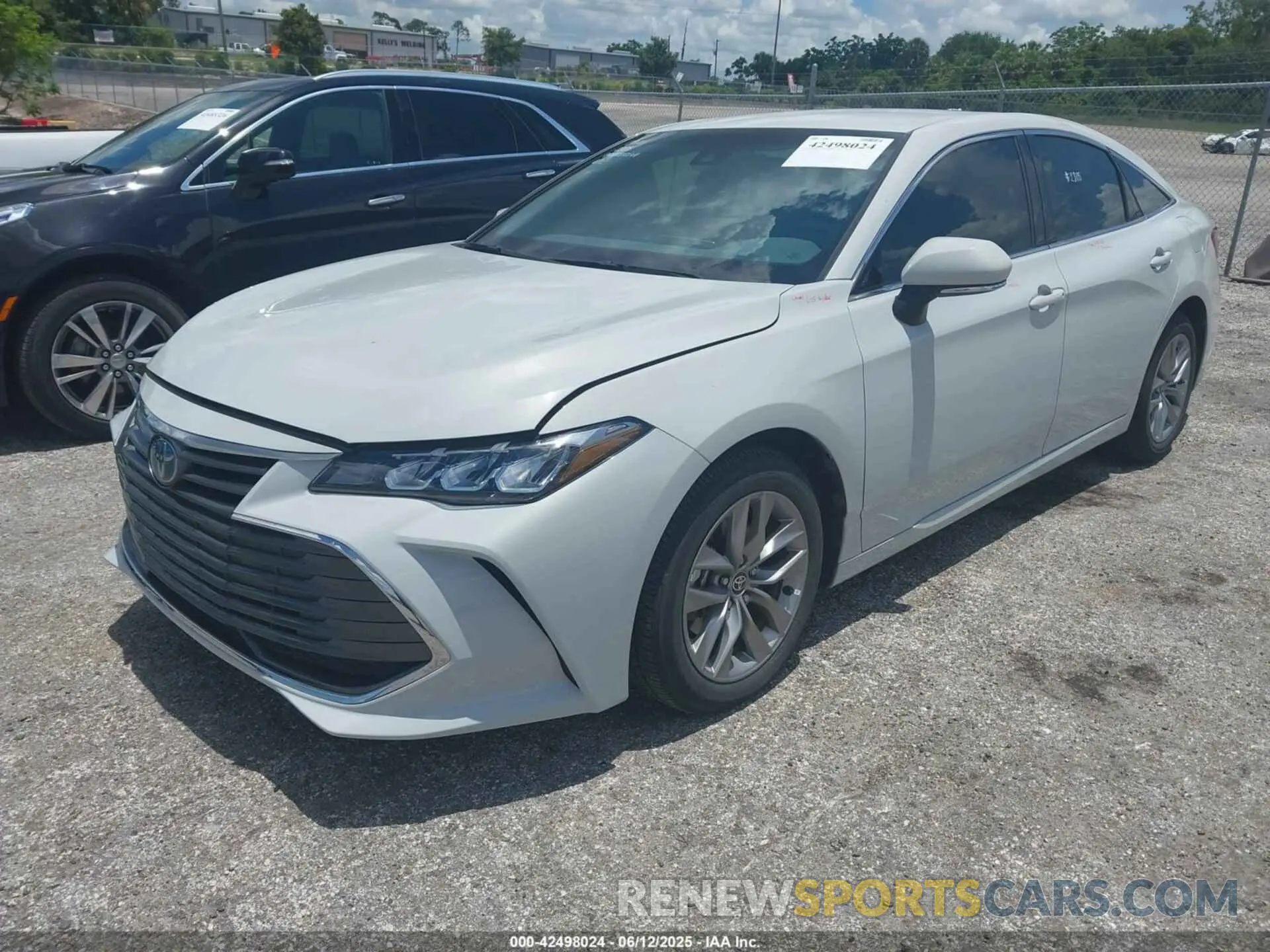 2 Photograph of a damaged car 4T1JA1AB5NU015841 TOYOTA AVALON 2022