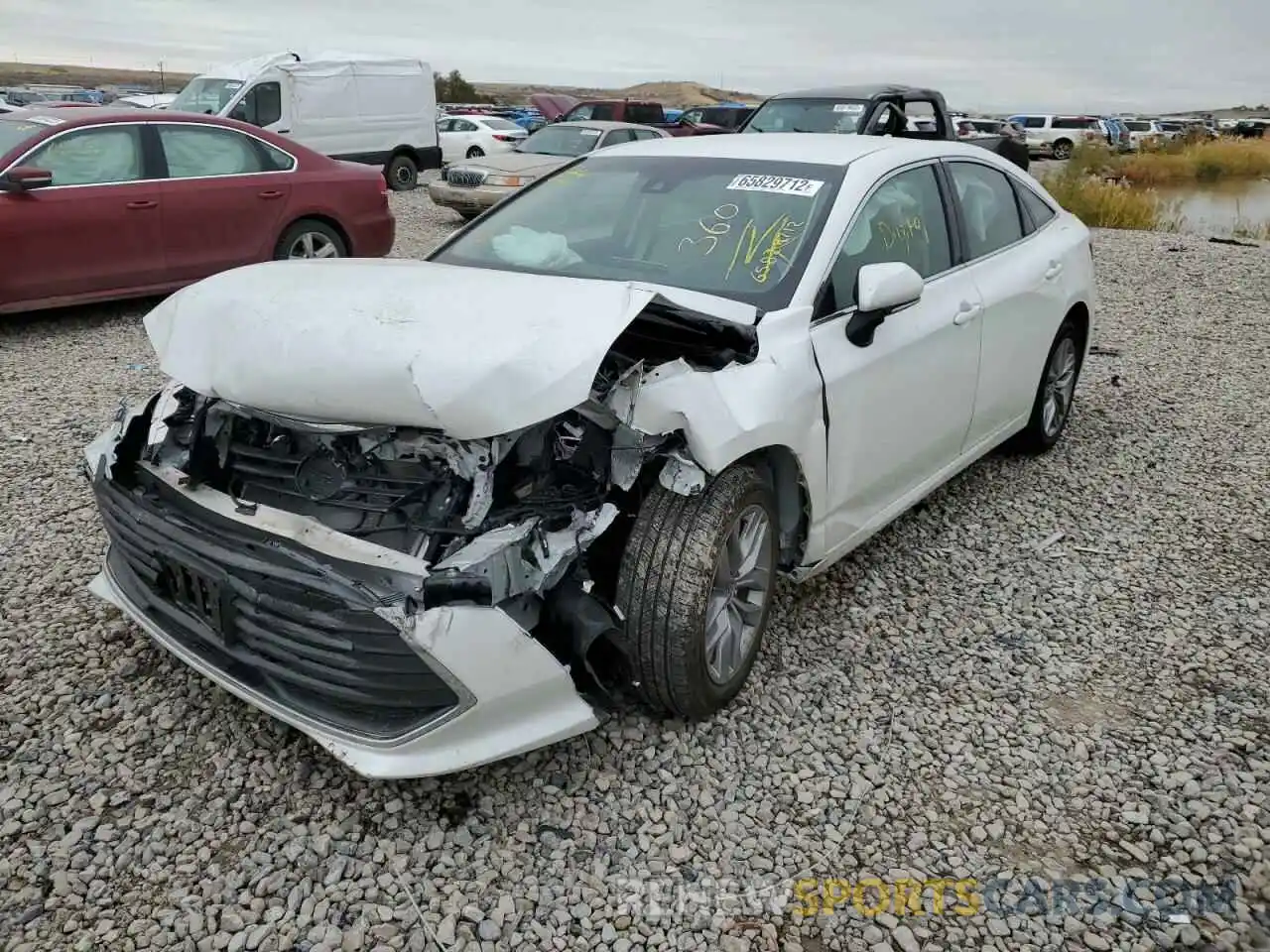 2 Photograph of a damaged car 4T1JA1AB6NU011801 TOYOTA AVALON 2022