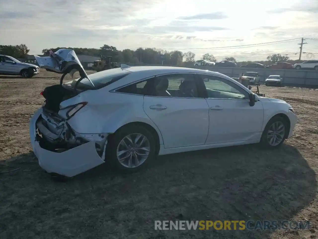 3 Photograph of a damaged car 4T1JZ1FB0NU083532 TOYOTA AVALON 2022