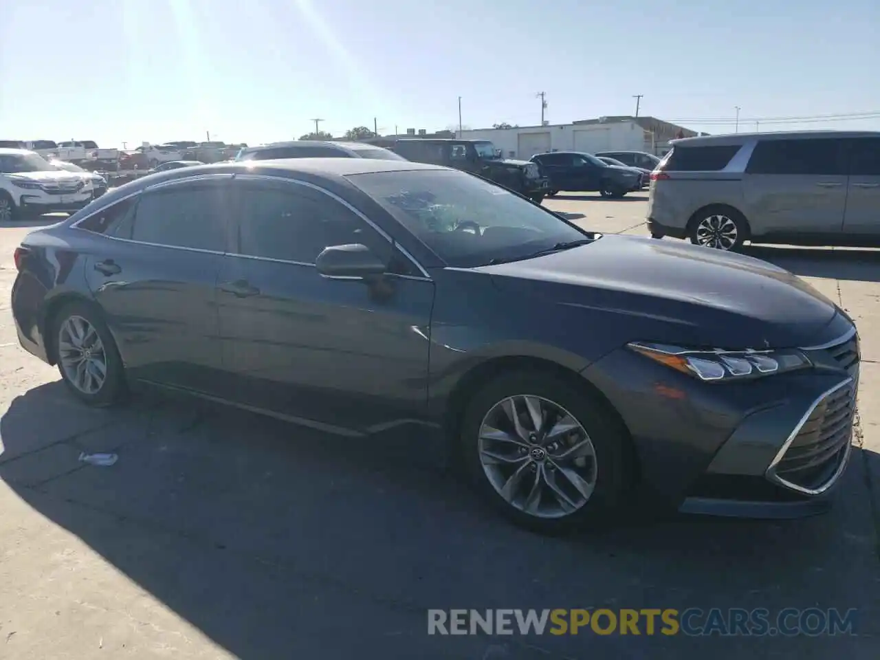 4 Photograph of a damaged car 4T1JZ1FB9NU075199 TOYOTA AVALON 2022