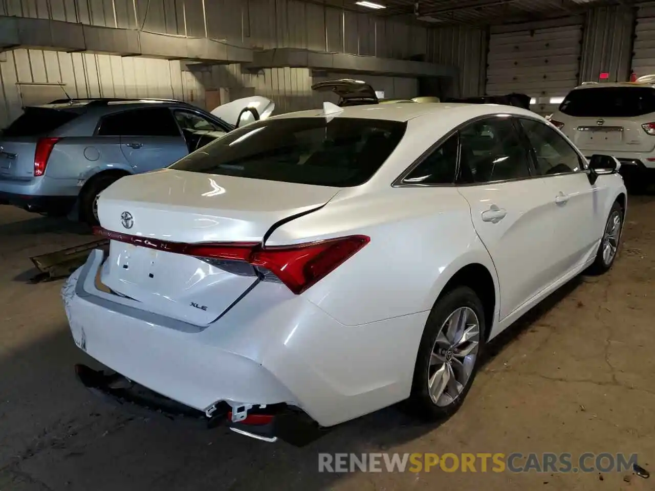 4 Photograph of a damaged car 4T1JZ1FB9NU087451 TOYOTA AVALON 2022