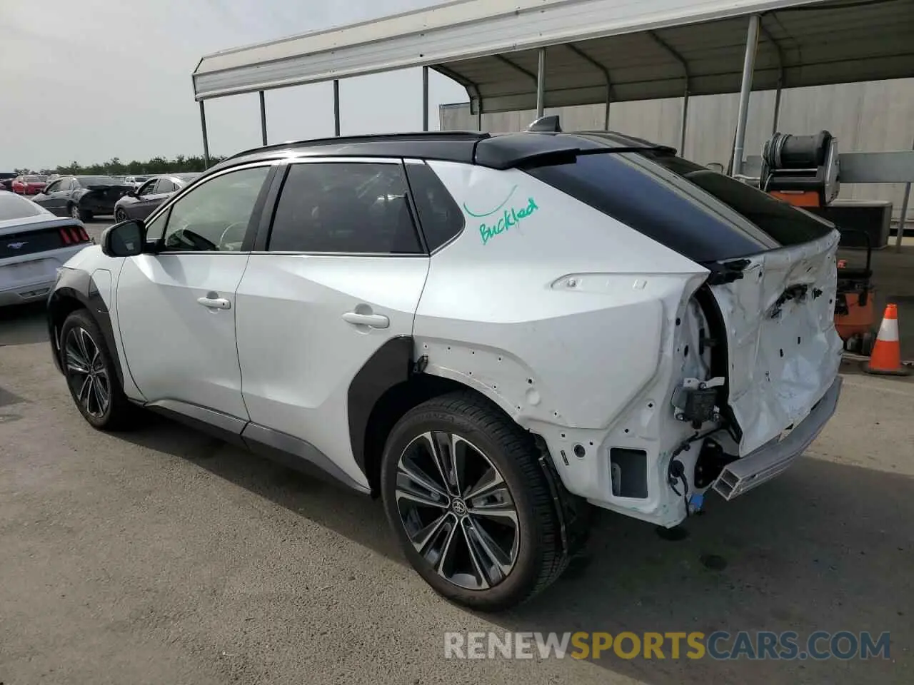 2 Photograph of a damaged car JTMABABA2PA003481 TOYOTA BZ4X XLE 2023