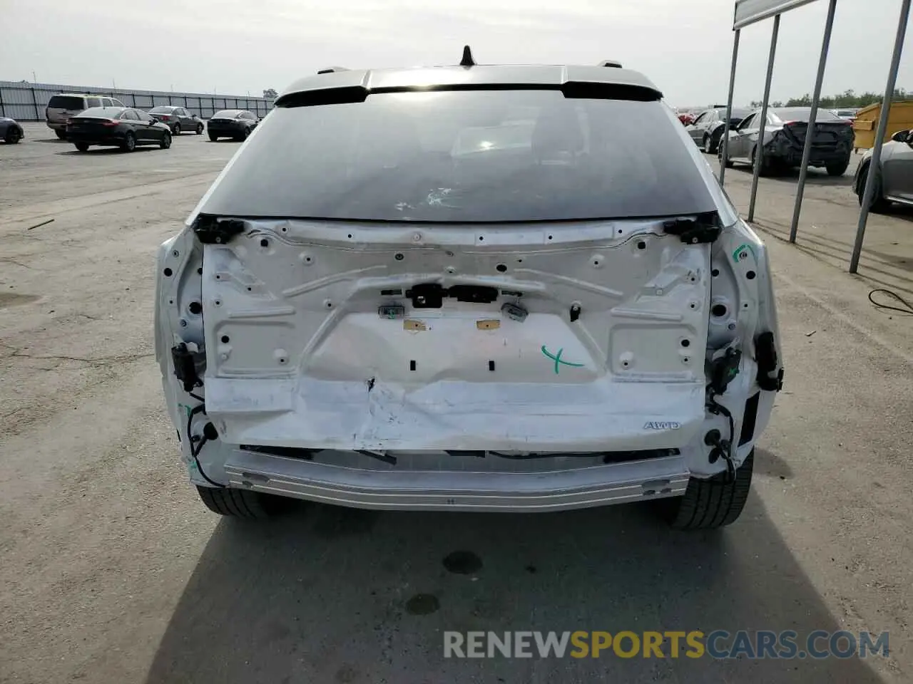 6 Photograph of a damaged car JTMABABA2PA003481 TOYOTA BZ4X XLE 2023