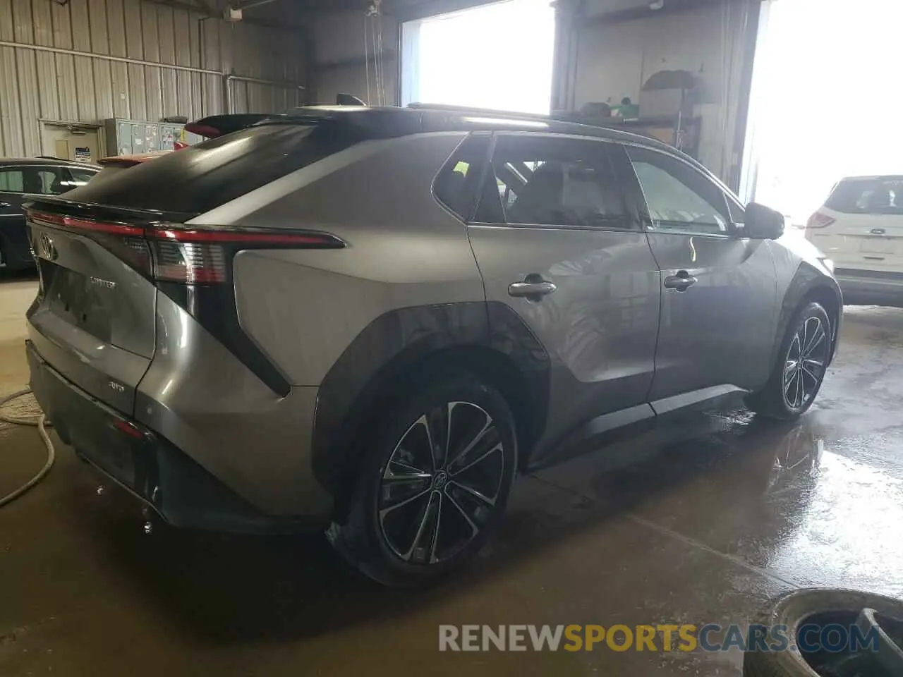 3 Photograph of a damaged car JTMABABA4PA003580 TOYOTA BZ4X XLE 2023