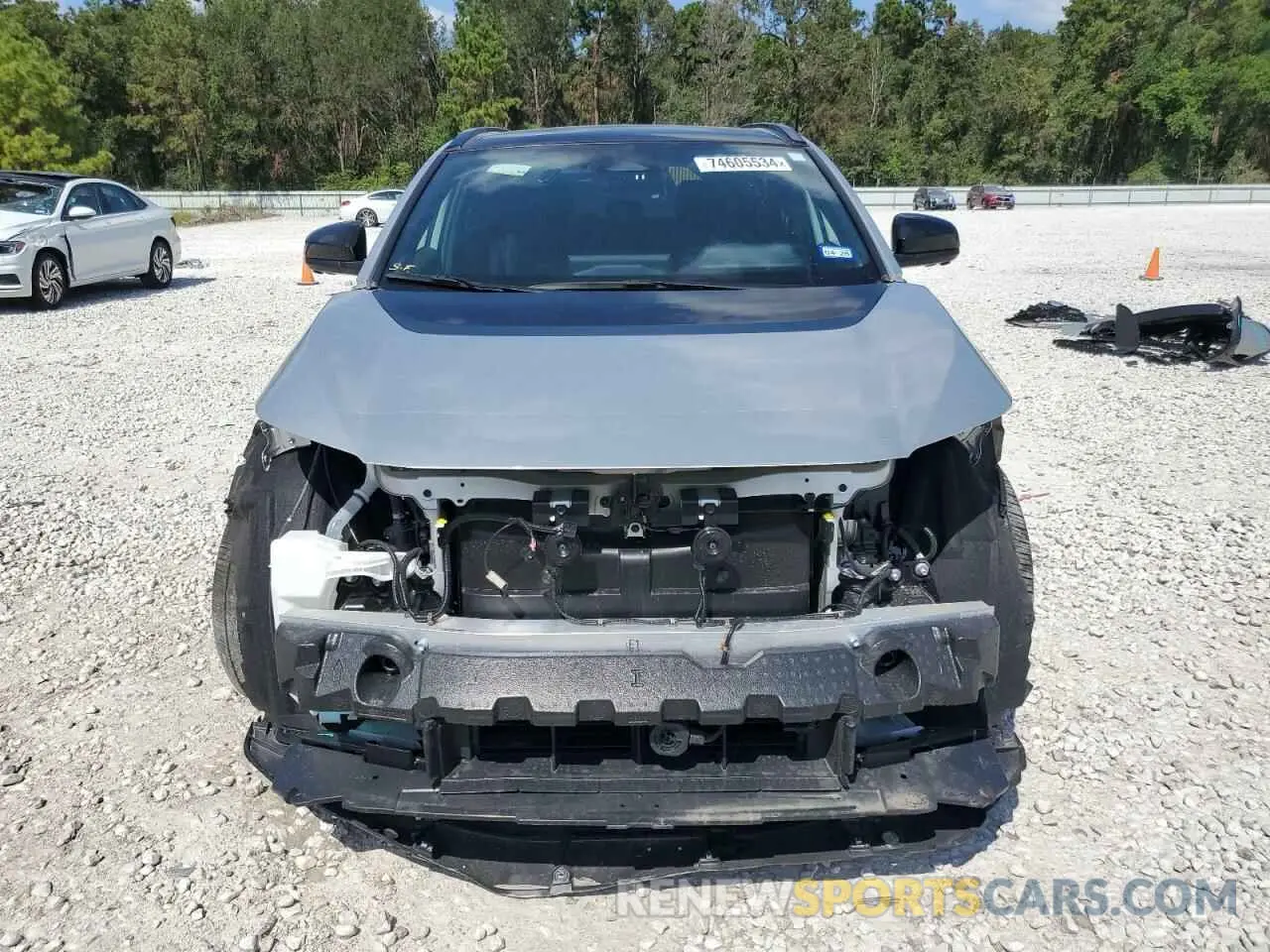 5 Photograph of a damaged car JTMABACA1PA042223 TOYOTA BZ4X XLE 2023