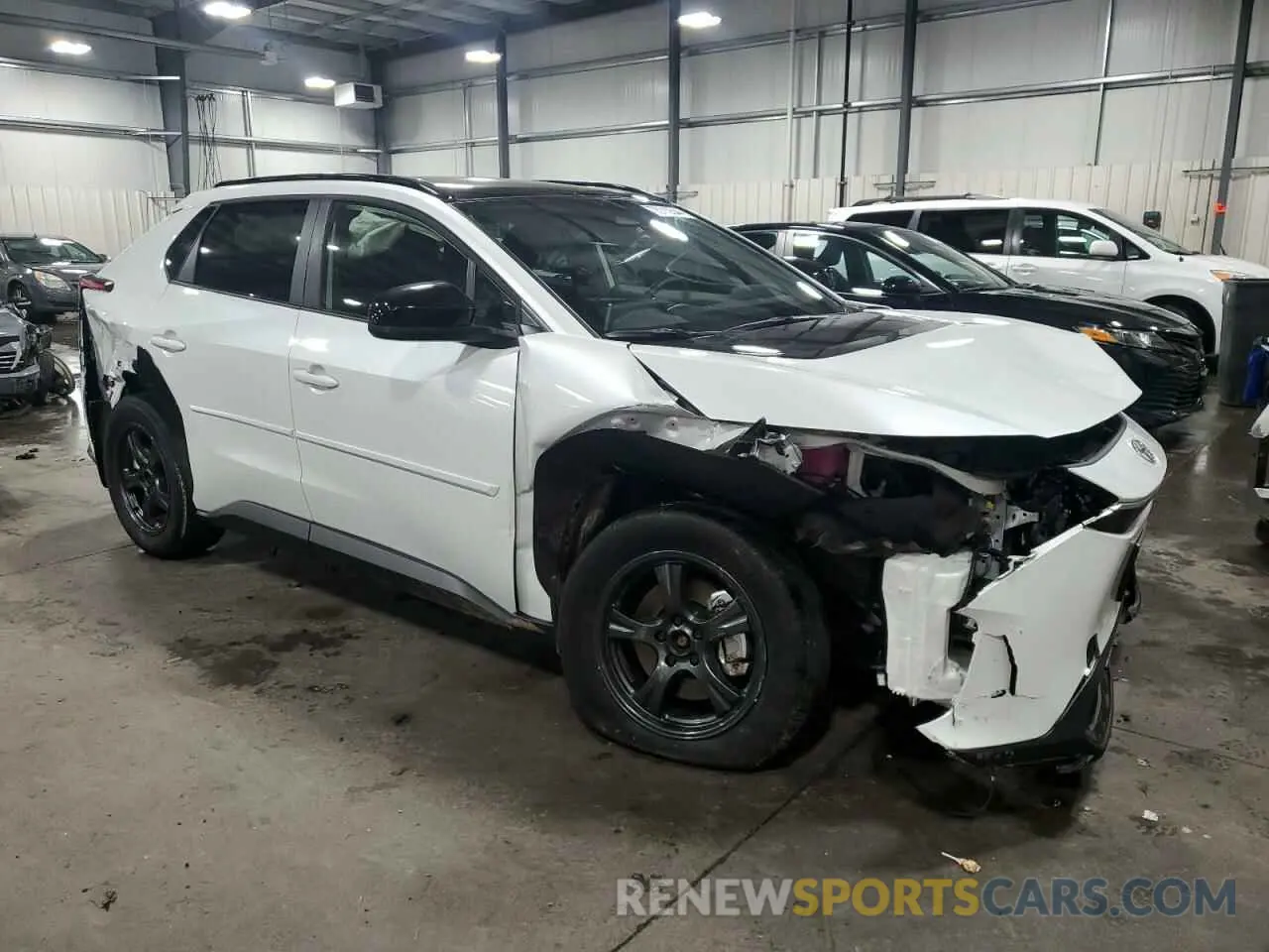 4 Photograph of a damaged car JTMABACA5PA023089 TOYOTA BZ4X XLE 2023