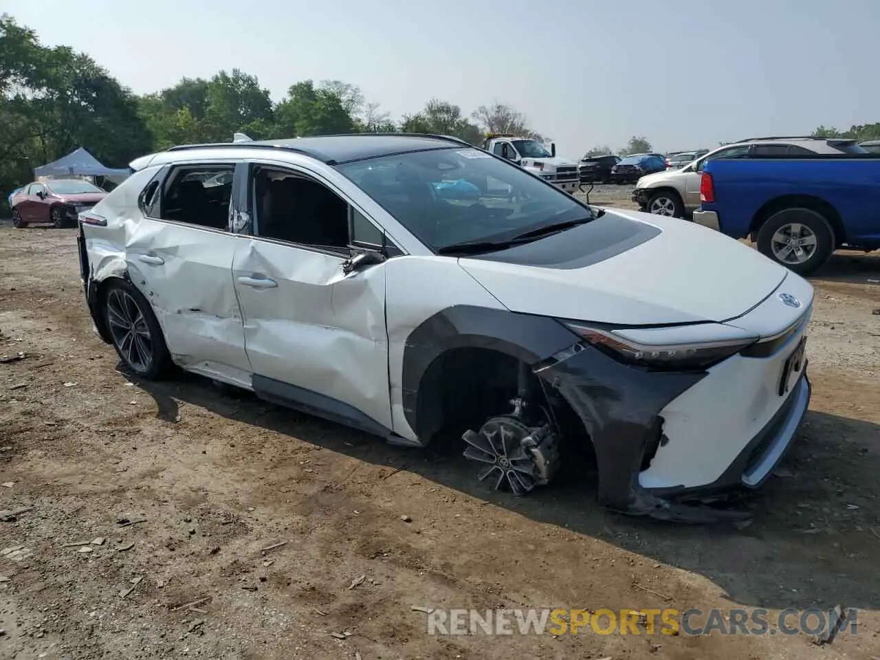 4 Photograph of a damaged car JTMABACA5PA026008 TOYOTA BZ4X XLE 2023