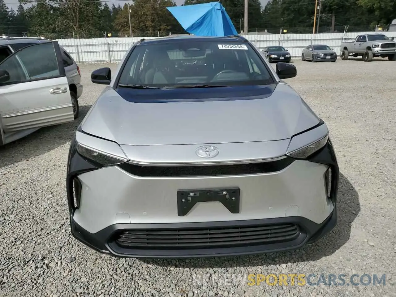 5 Photograph of a damaged car JTMABACAXPA015022 TOYOTA BZ4X XLE 2023