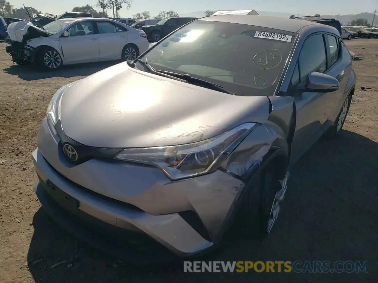 2 Photograph of a damaged car JTNKHMBX0K1014203 TOYOTA C-HR 2019