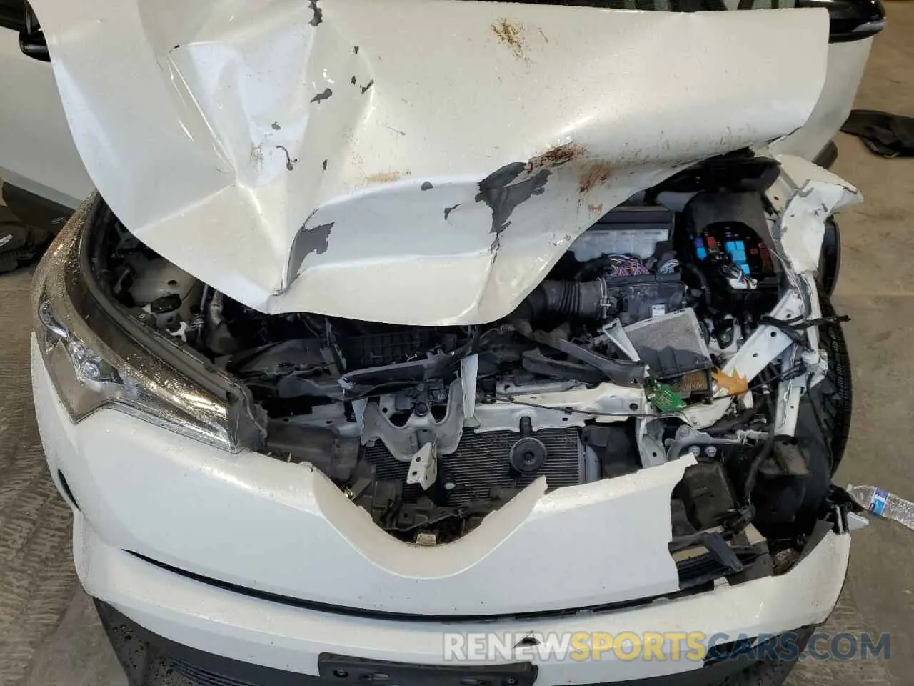 11 Photograph of a damaged car JTNKHMBX1K1039238 TOYOTA C-HR 2019