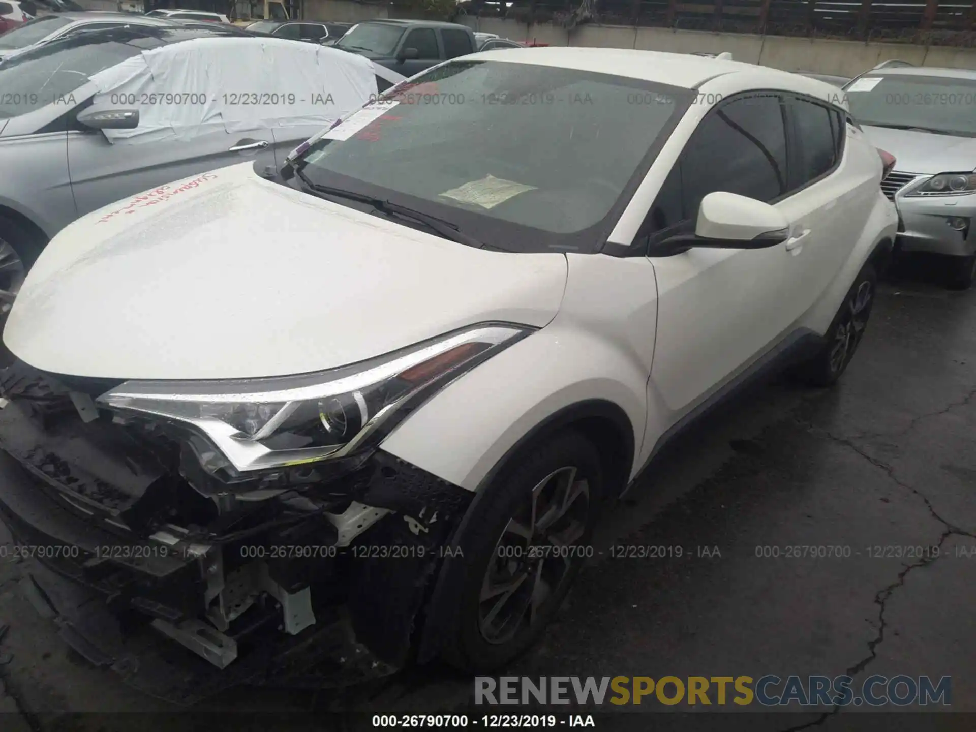 2 Photograph of a damaged car JTNKHMBX2K1013649 TOYOTA C-HR 2019