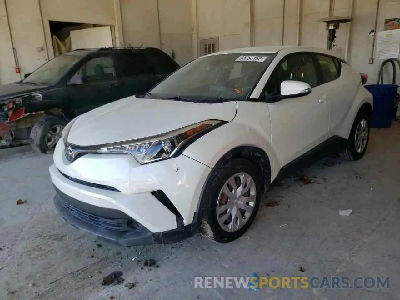 2 Photograph of a damaged car JTNKHMBX2K1026014 TOYOTA C-HR 2019