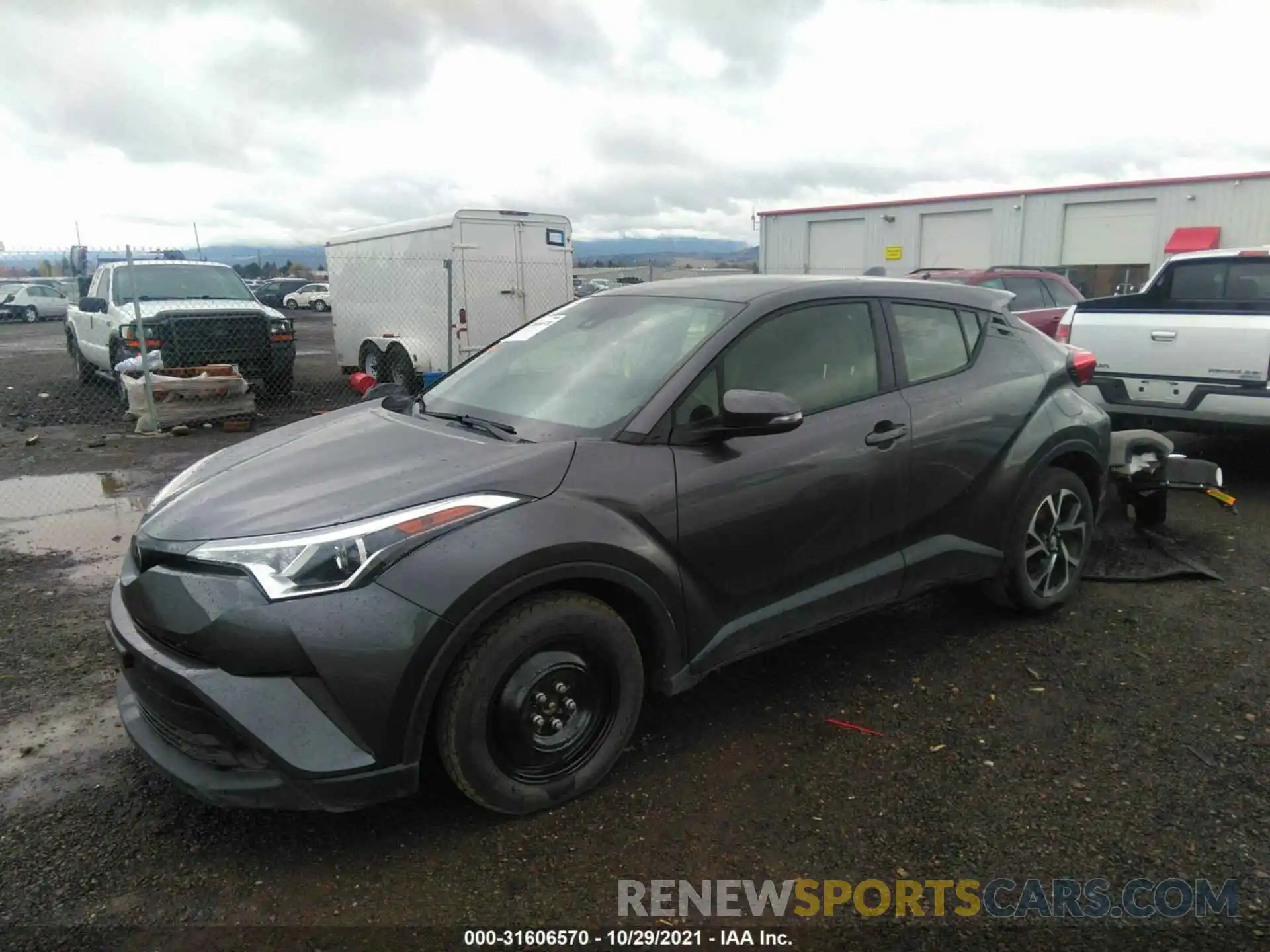 2 Photograph of a damaged car JTNKHMBX2K1030371 TOYOTA C-HR 2019