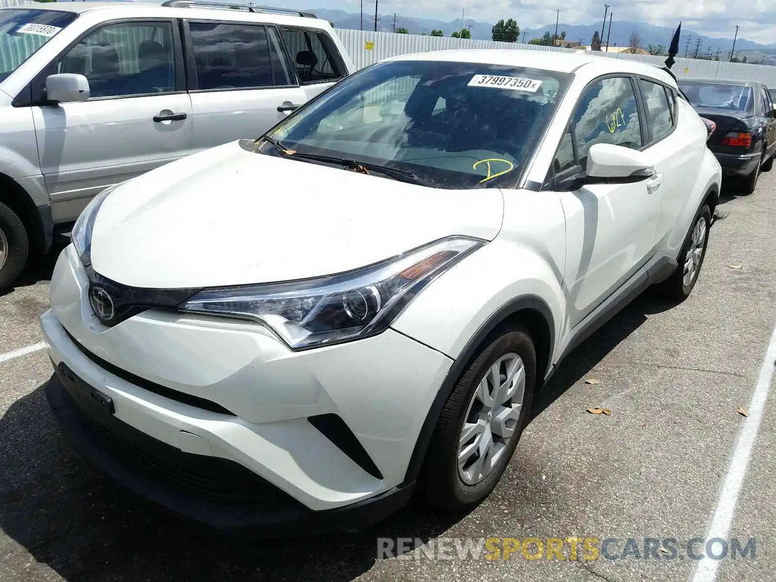 2 Photograph of a damaged car JTNKHMBX2K1033707 TOYOTA C-HR 2019