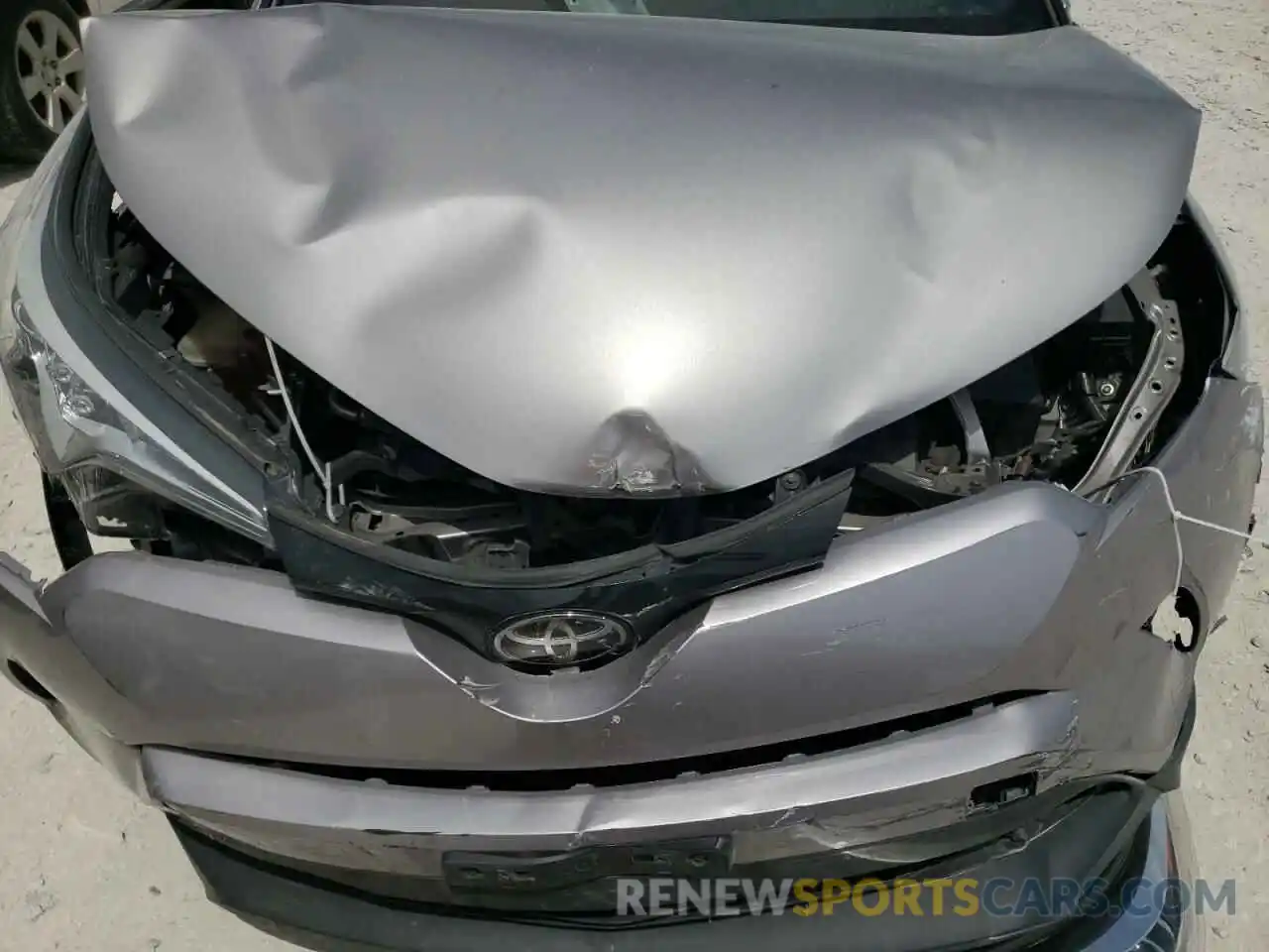 7 Photograph of a damaged car JTNKHMBX4K1021431 TOYOTA C-HR 2019