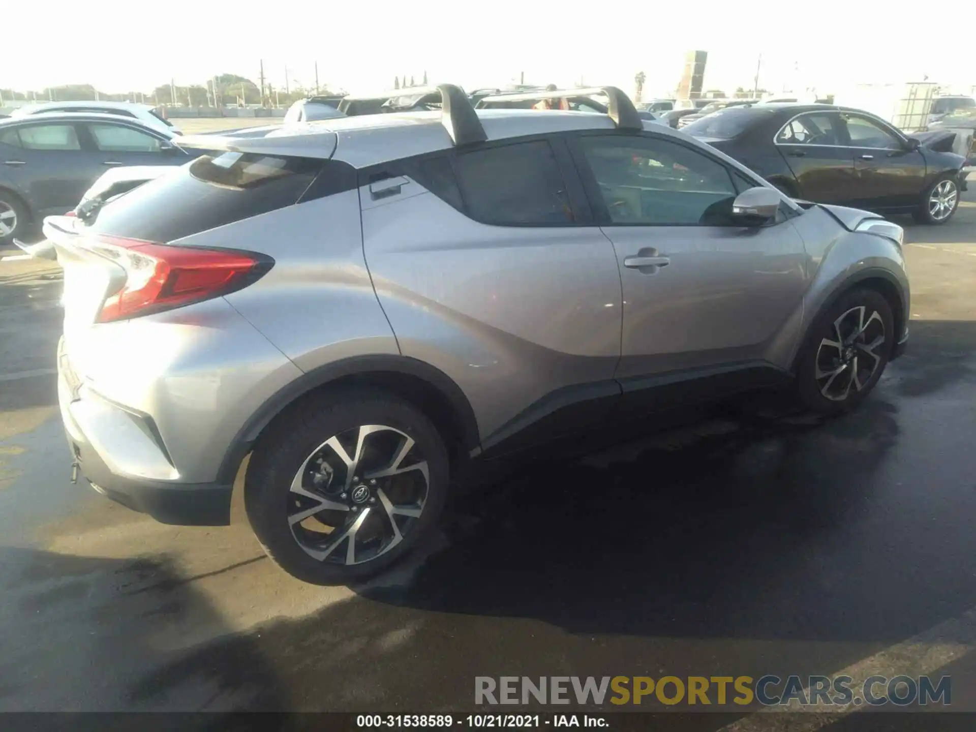 4 Photograph of a damaged car JTNKHMBX5K1039792 TOYOTA C-HR 2019