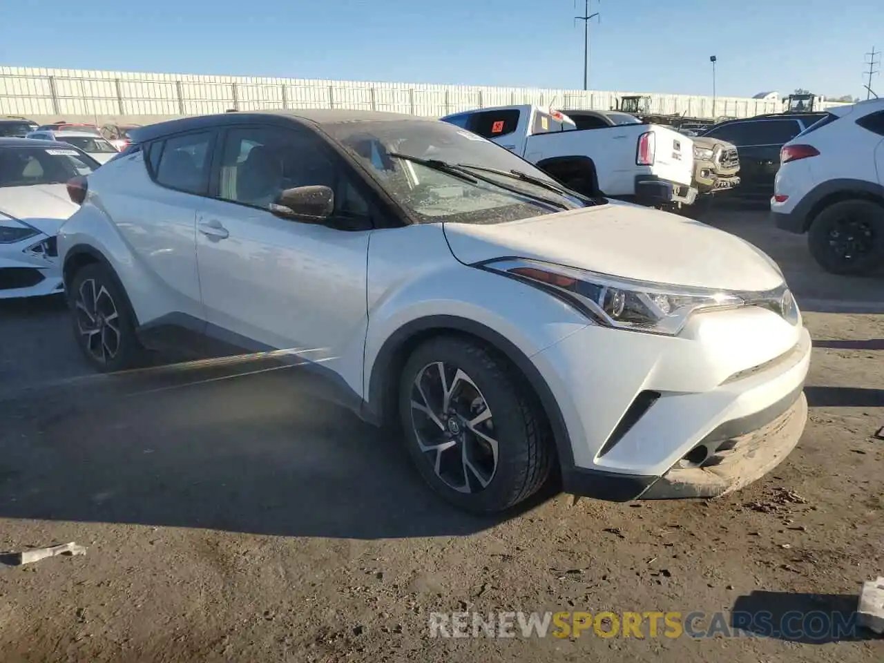 4 Photograph of a damaged car JTNKHMBX6K1025951 TOYOTA C-HR 2019