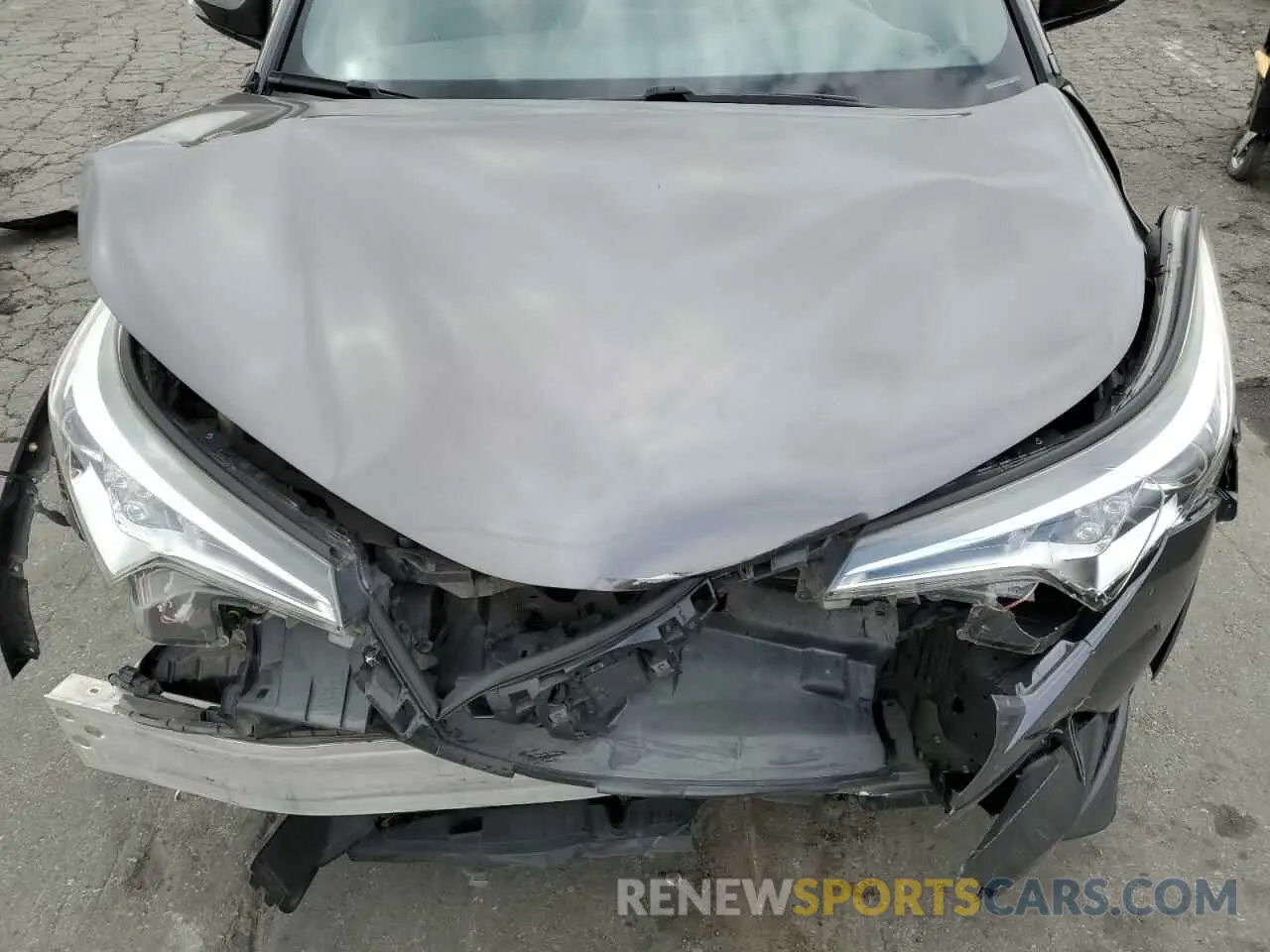 11 Photograph of a damaged car JTNKHMBX6K1032415 TOYOTA C-HR 2019