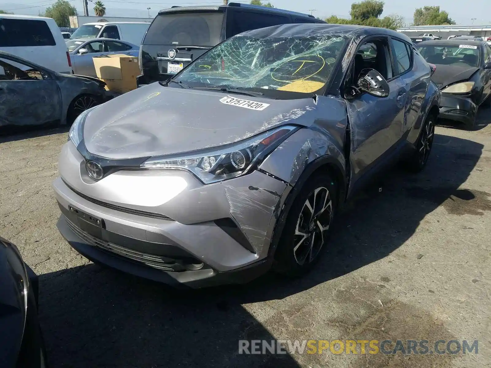 2 Photograph of a damaged car JTNKHMBX6K1058450 TOYOTA C-HR 2019