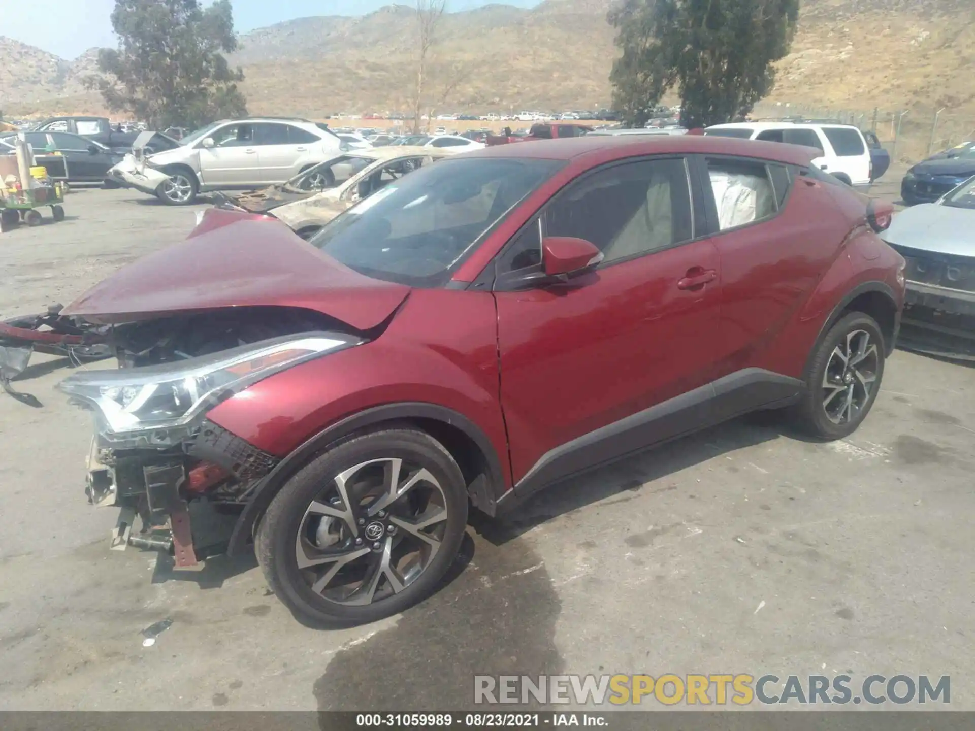 2 Photograph of a damaged car JTNKHMBX7K1031421 TOYOTA C-HR 2019