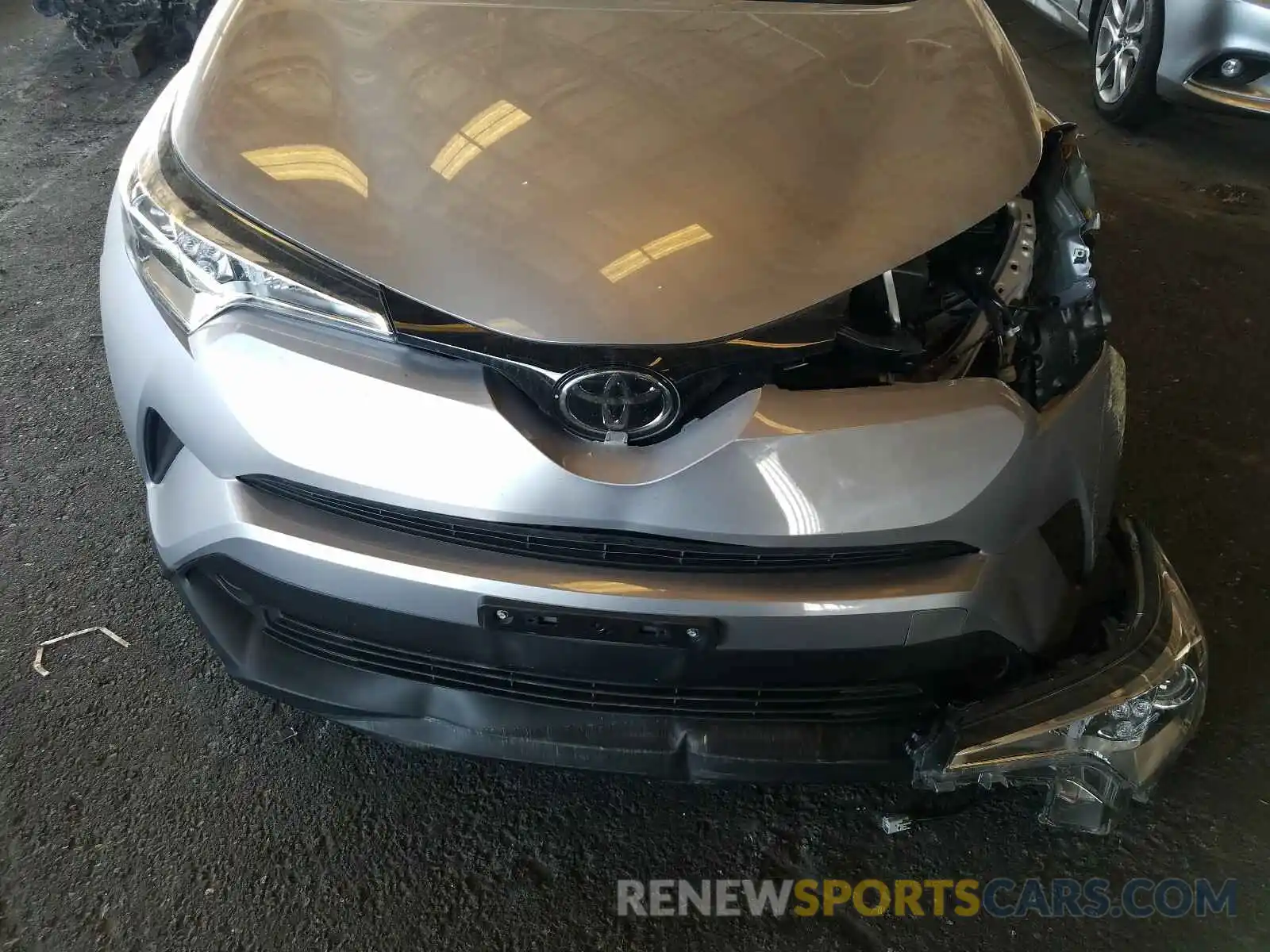 7 Photograph of a damaged car JTNKHMBX7K1043021 TOYOTA C-HR 2019