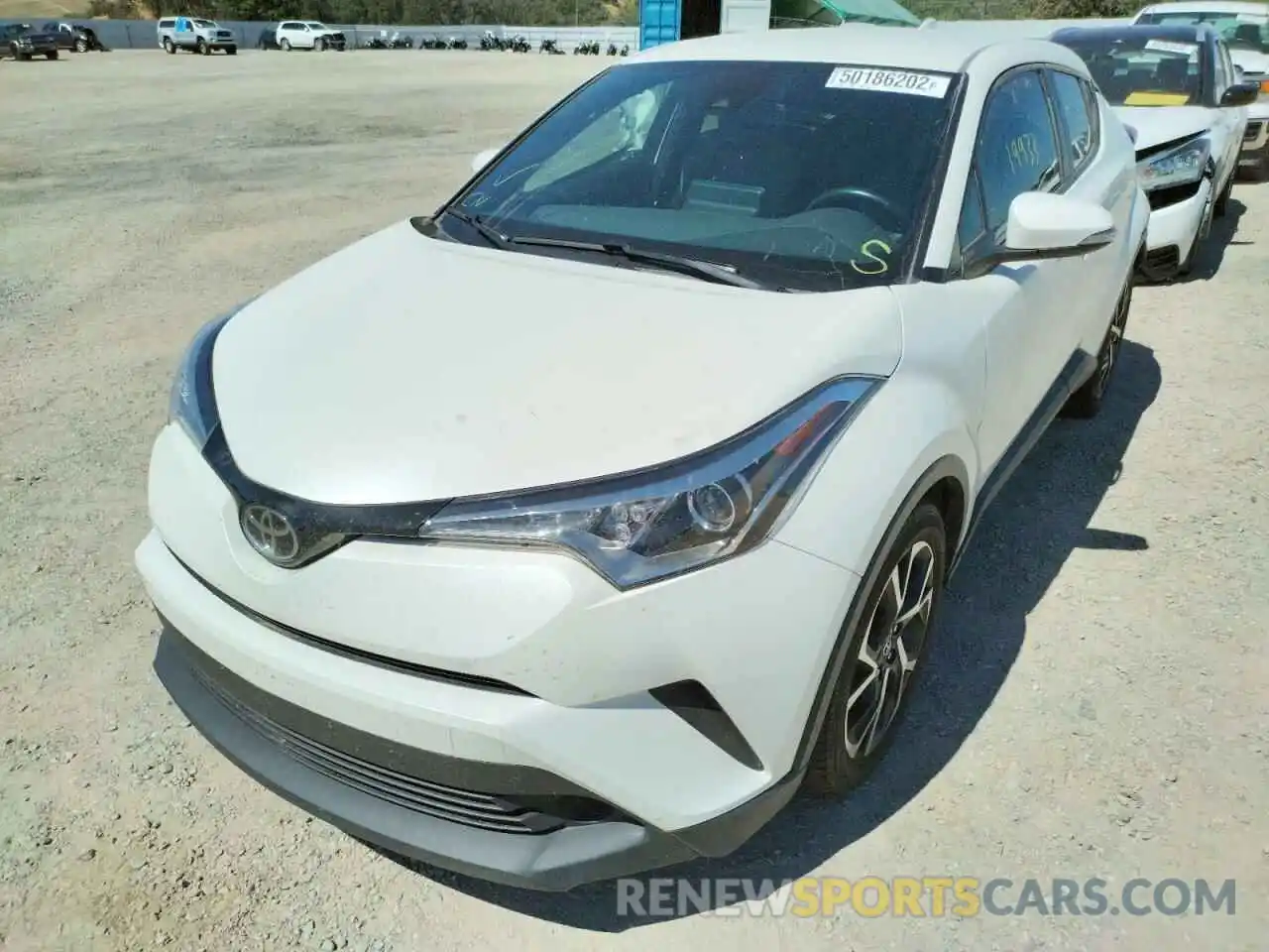 2 Photograph of a damaged car JTNKHMBX8K1012487 TOYOTA C-HR 2019