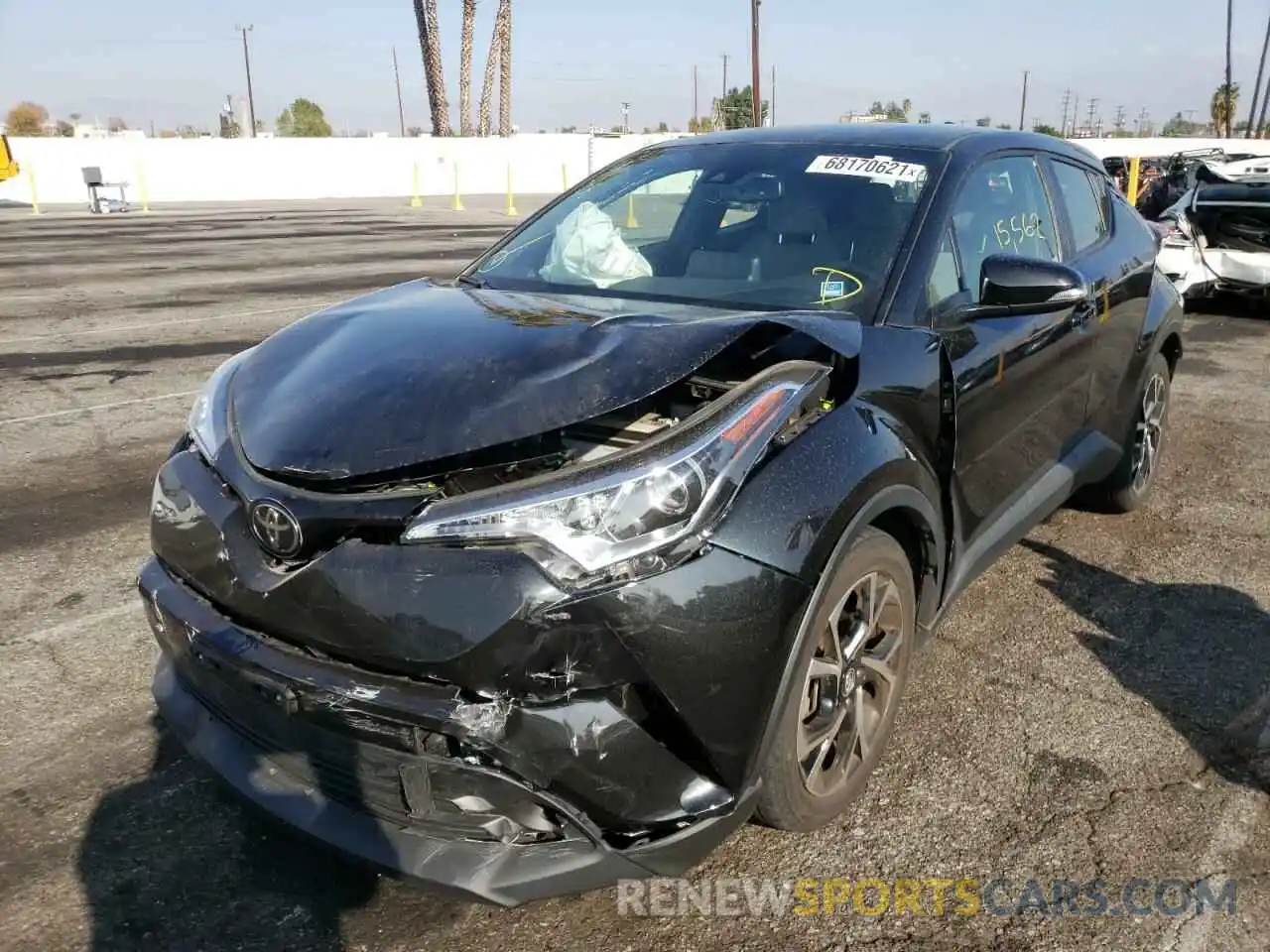 2 Photograph of a damaged car JTNKHMBX8K1030455 TOYOTA C-HR 2019