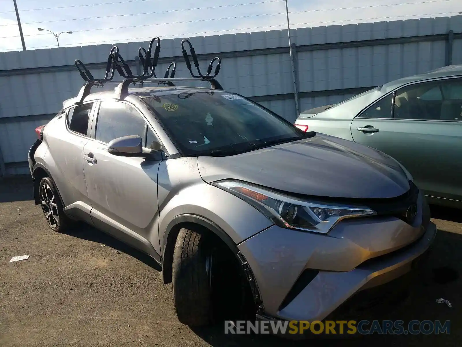 1 Photograph of a damaged car JTNKHMBX8K1052584 TOYOTA C-HR 2019