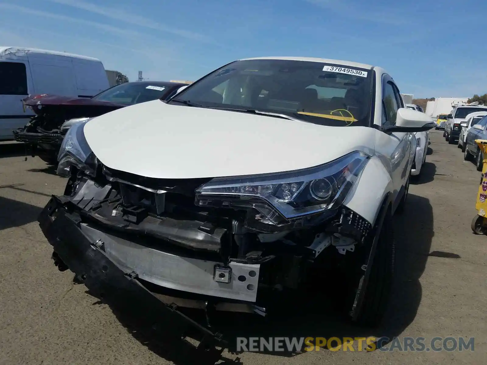 2 Photograph of a damaged car JTNKHMBX8K1053654 TOYOTA C-HR 2019