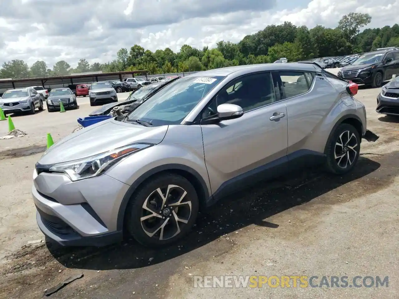 1 Photograph of a damaged car JTNKHMBXXK1019974 TOYOTA C-HR 2019