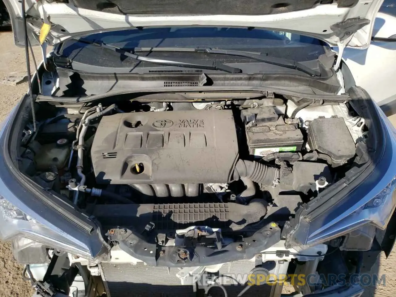 12 Photograph of a damaged car JTNKHMBXXK1057124 TOYOTA C-HR 2019