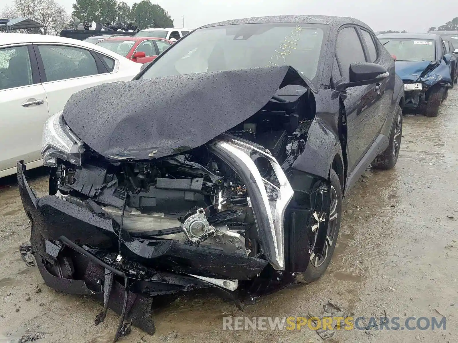 2 Photograph of a damaged car NMTKHMBX1KR099073 TOYOTA C-HR 2019