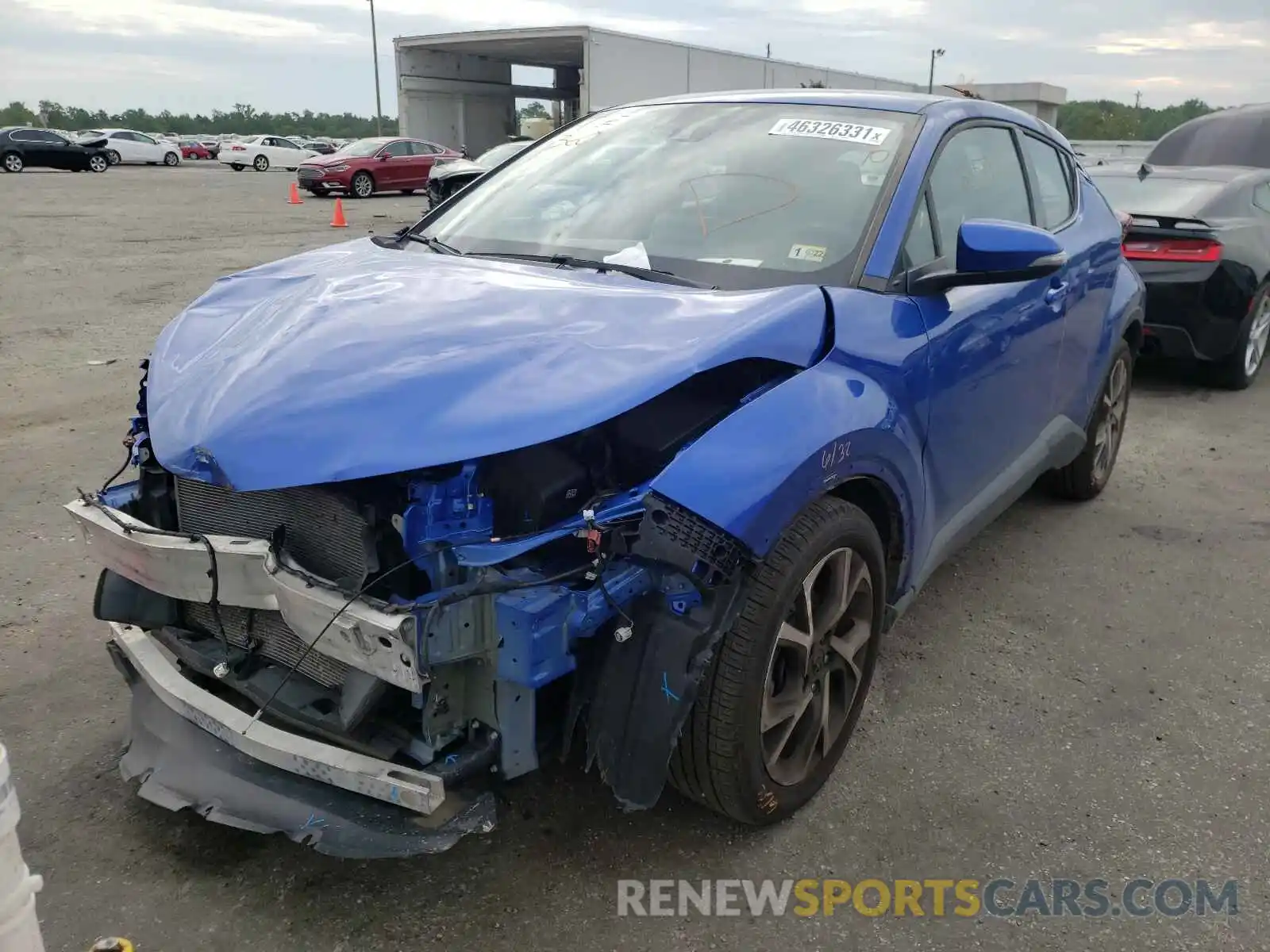 2 Photograph of a damaged car NMTKHMBX3KR078726 TOYOTA C-HR 2019