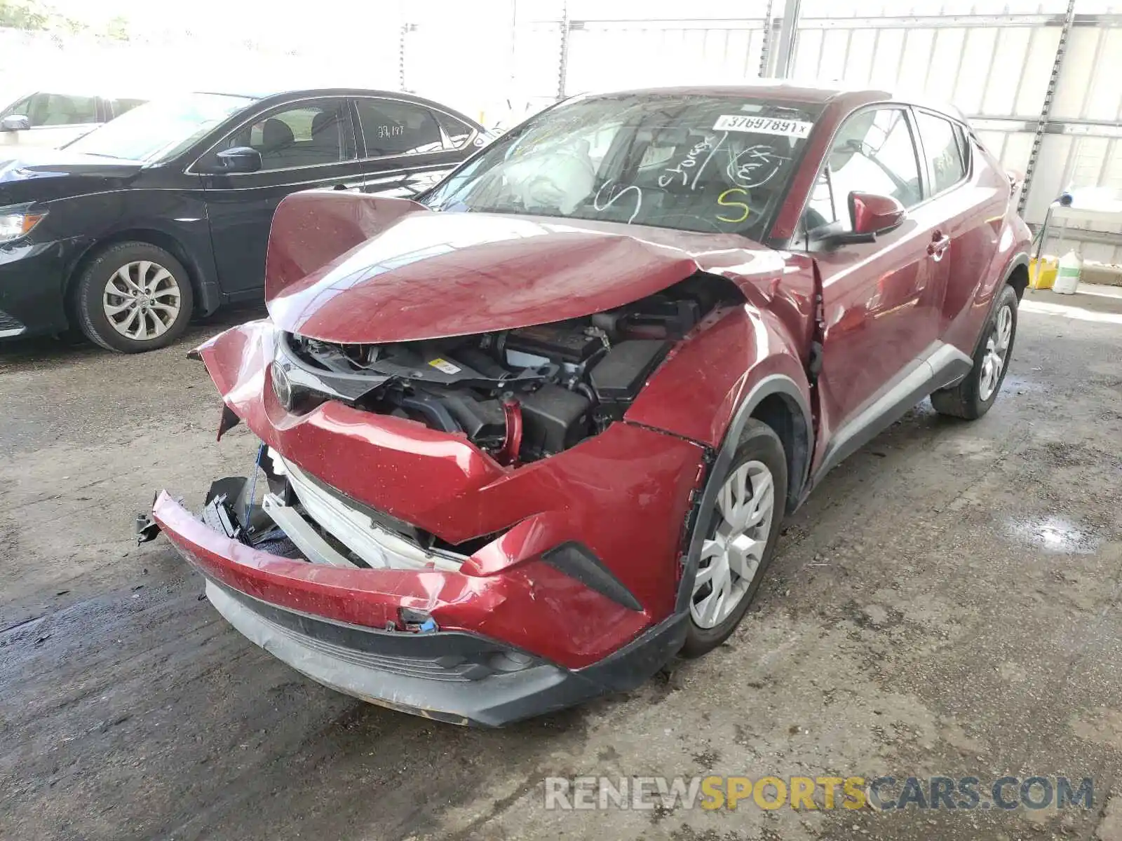 2 Photograph of a damaged car NMTKHMBX7KR096856 TOYOTA C-HR 2019