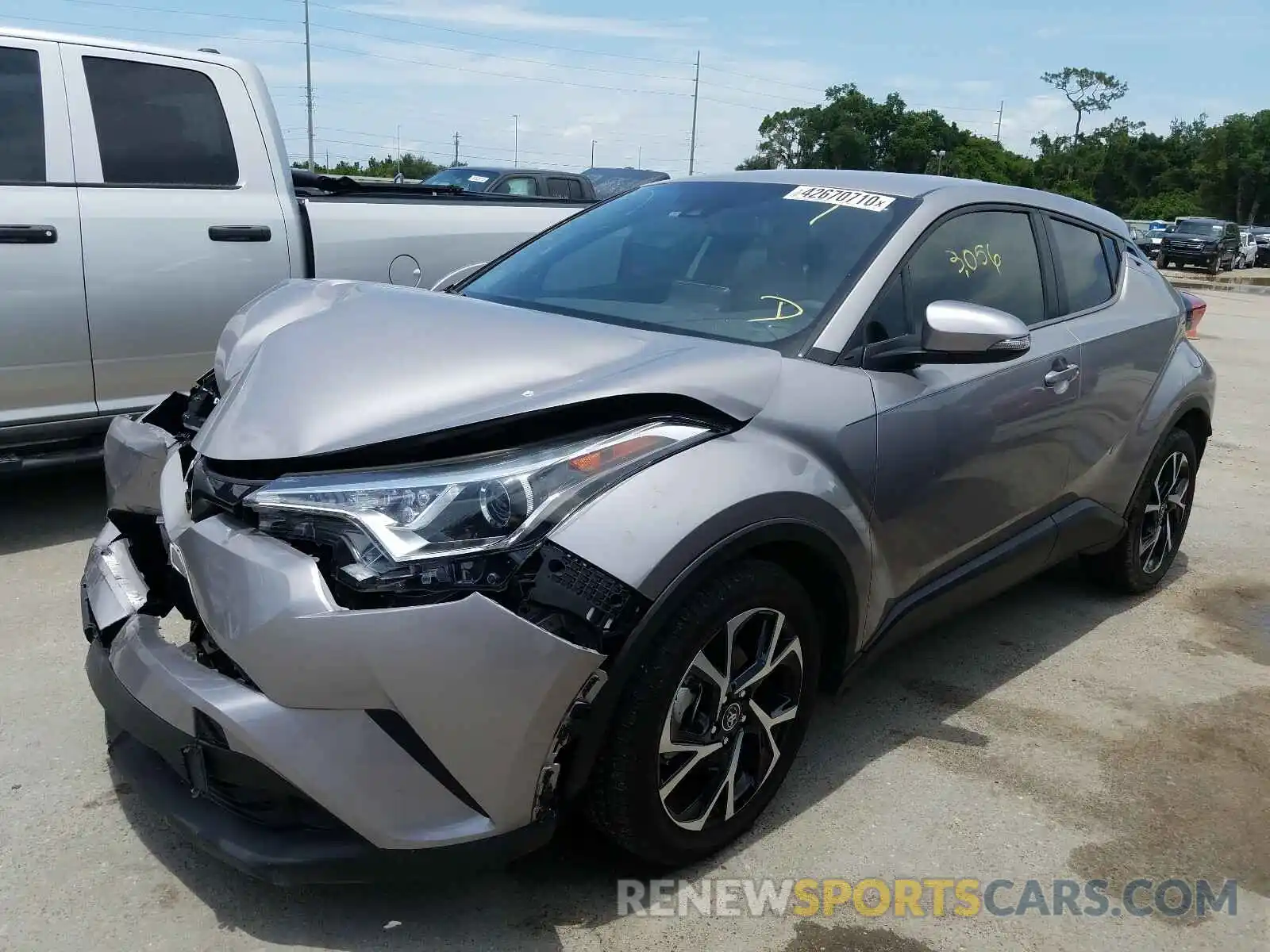 2 Photograph of a damaged car NMTKHMBX8KR101482 TOYOTA C-HR 2019