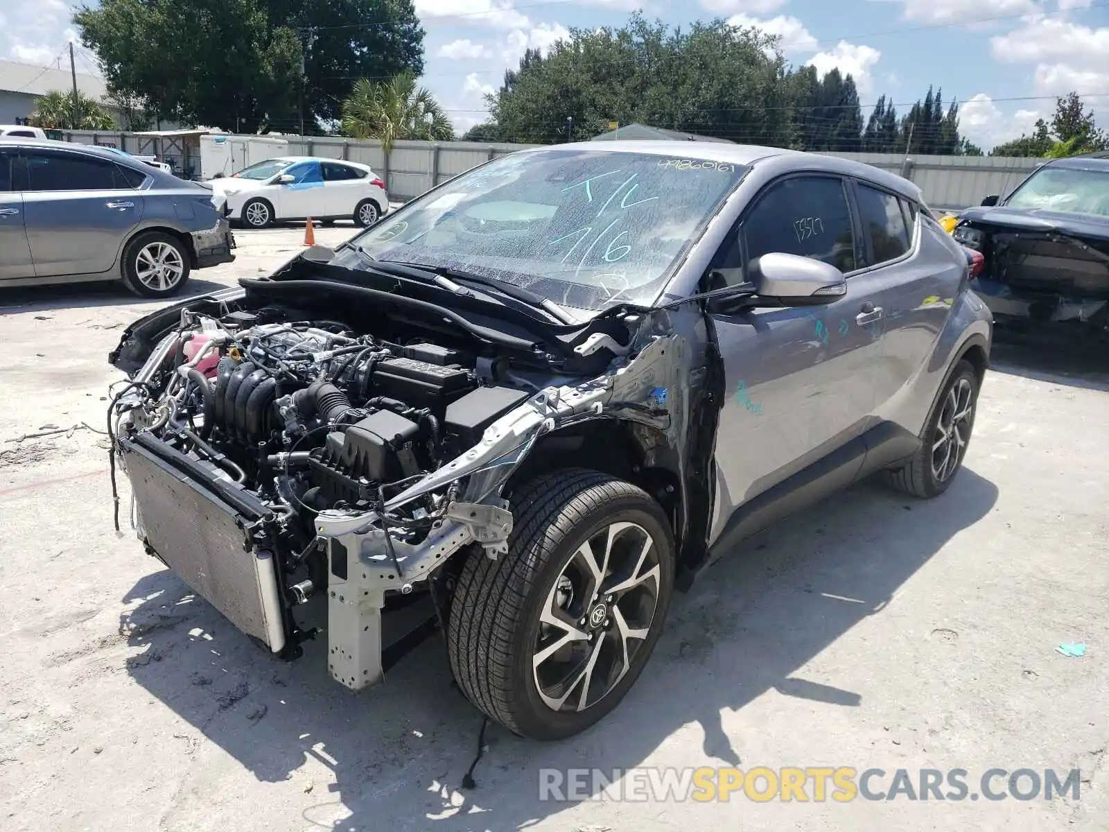 2 Photograph of a damaged car NMTKHMBX5LR113056 TOYOTA C-HR 2020