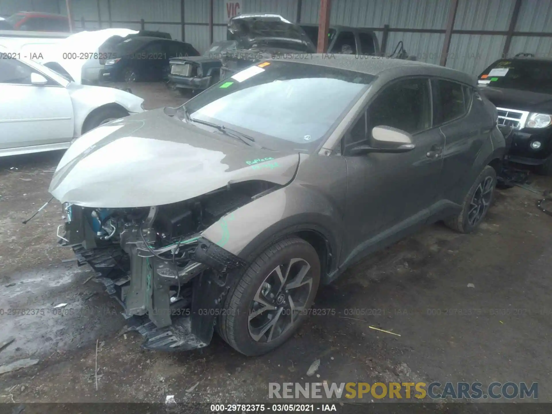 2 Photograph of a damaged car JTNKHMBX0M1103014 TOYOTA C-HR 2021