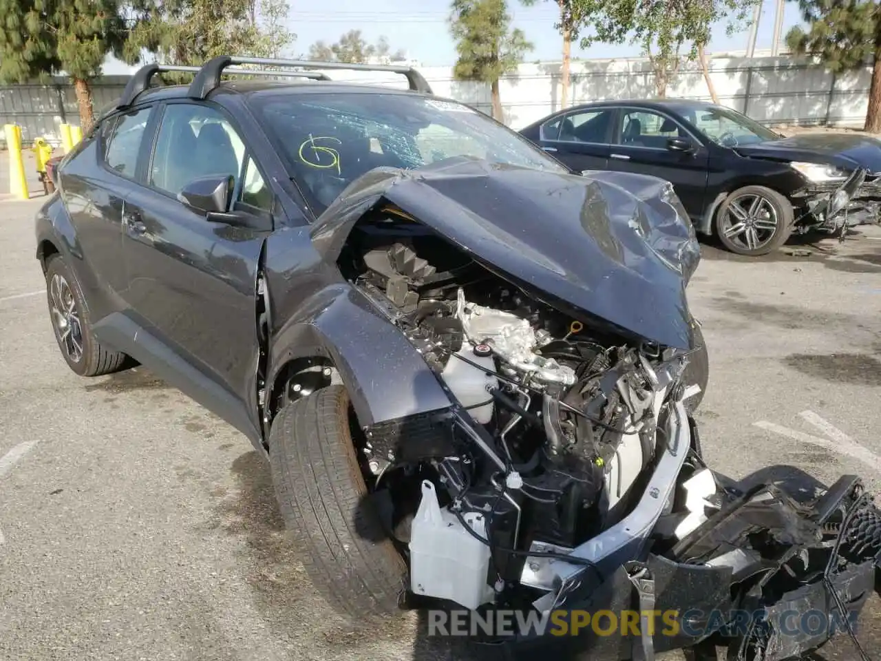 1 Photograph of a damaged car JTNKHMBX0M1118404 TOYOTA C-HR 2021