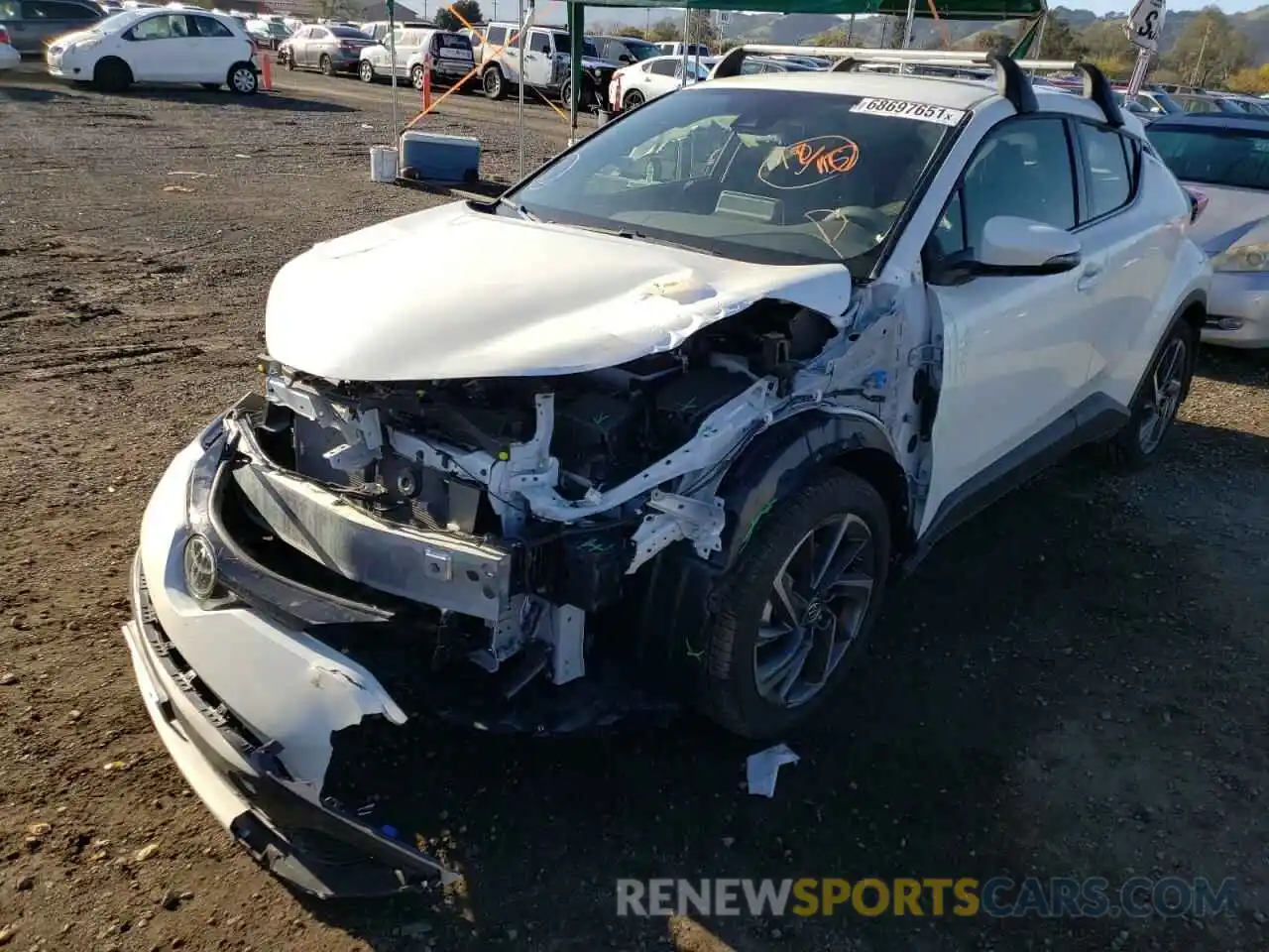 2 Photograph of a damaged car JTNKHMBX1M1122879 TOYOTA C-HR 2021