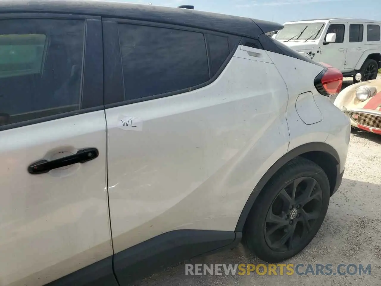 12 Photograph of a damaged car JTNKHMBX2M1111986 TOYOTA C-HR 2021