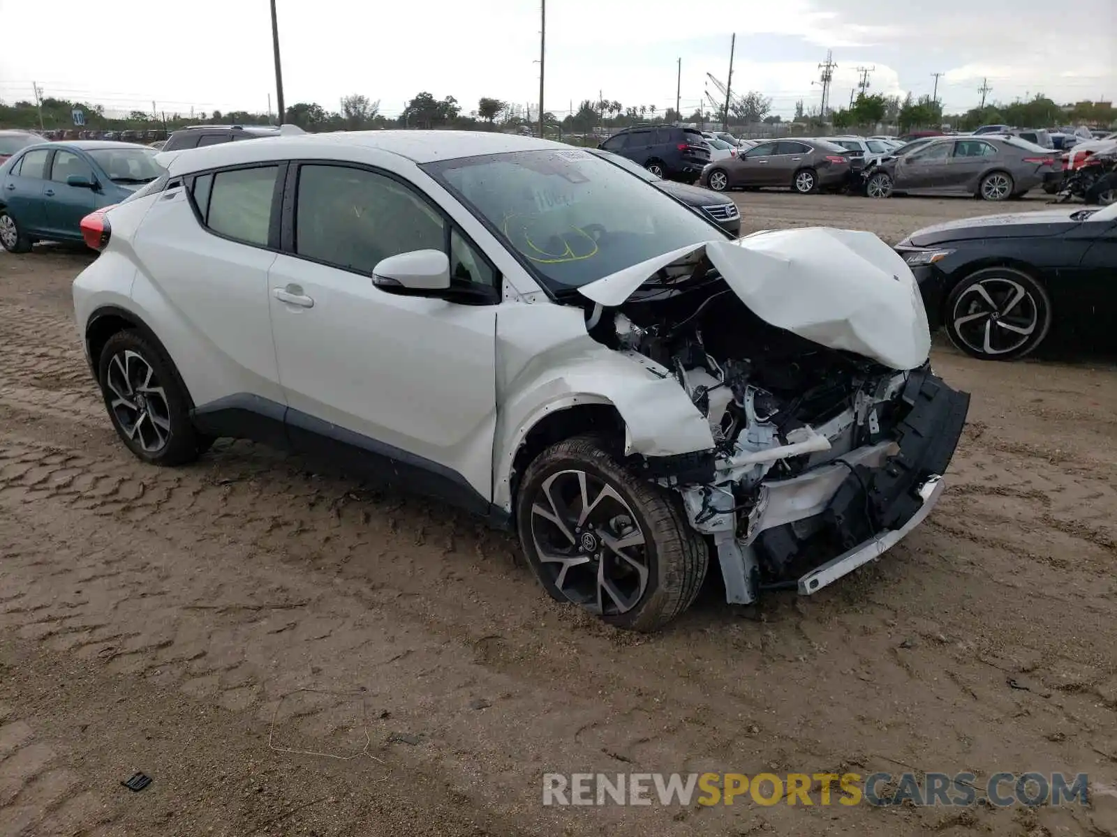 1 Photograph of a damaged car JTNKHMBX3M1103895 TOYOTA C-HR 2021