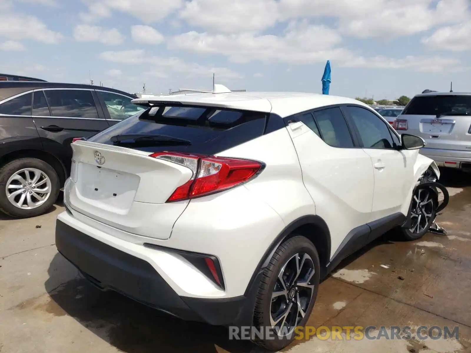 4 Photograph of a damaged car JTNKHMBX7M1105391 TOYOTA C-HR 2021