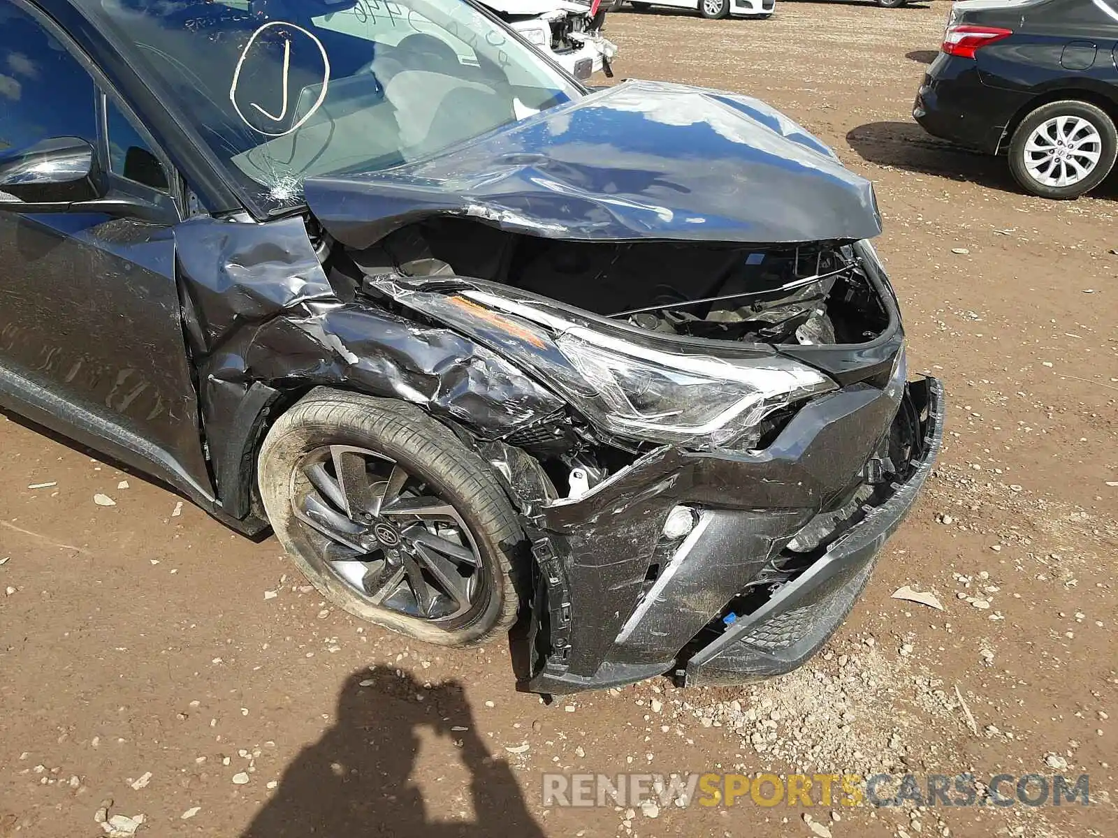 9 Photograph of a damaged car JTNKHMBX9M1095012 TOYOTA C-HR 2021