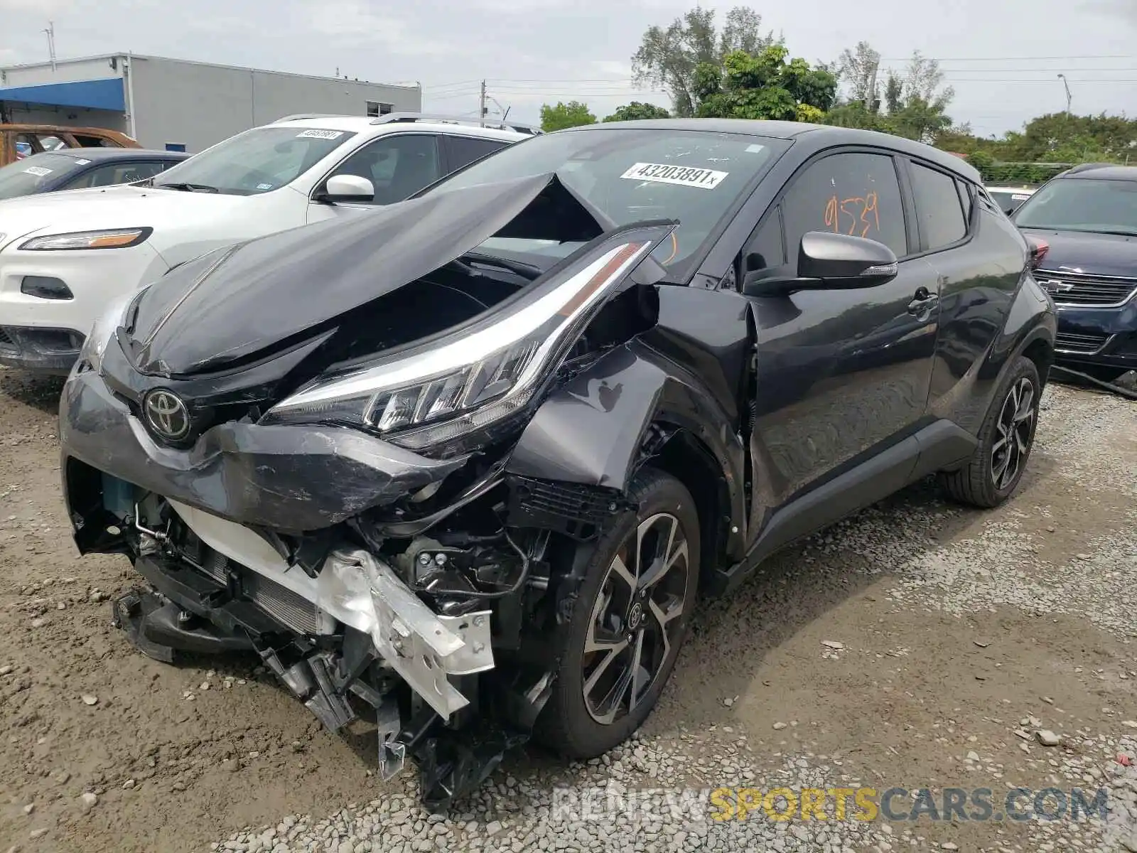 2 Photograph of a damaged car JTNKHMBX9M1099321 TOYOTA C-HR 2021