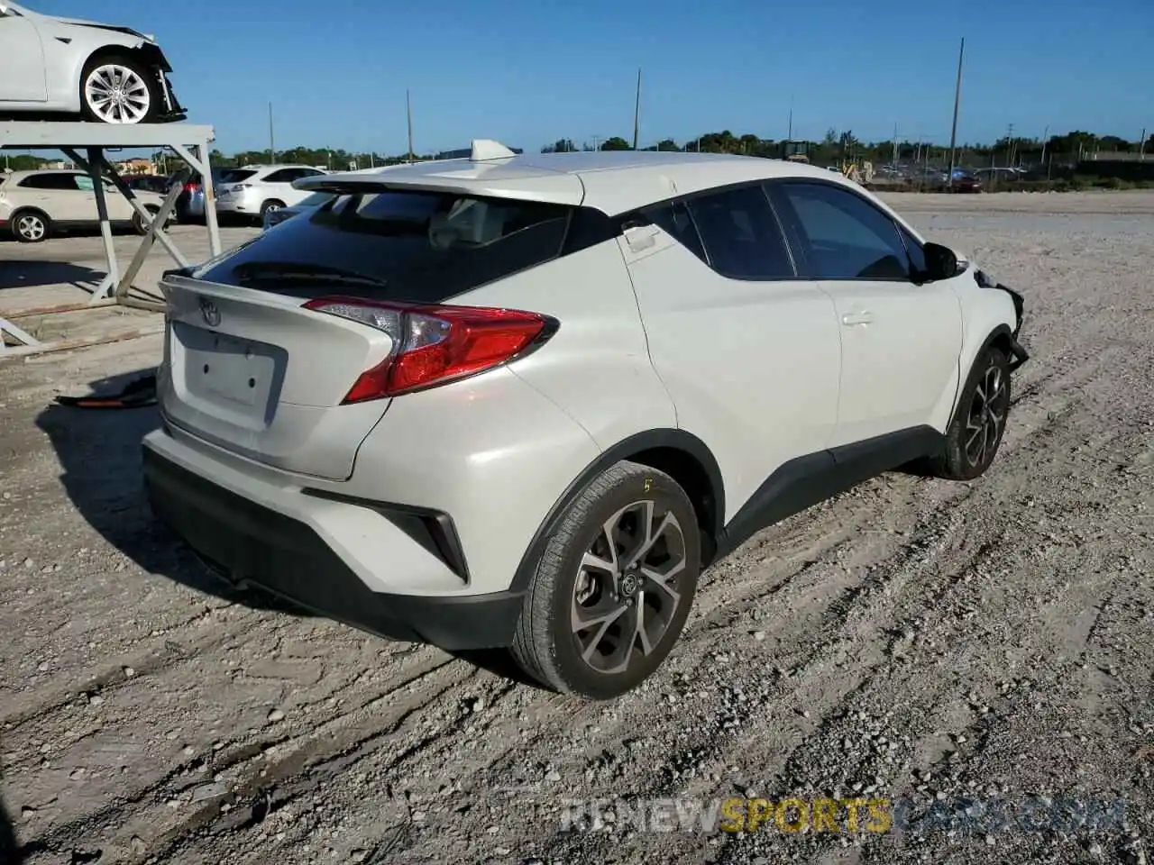 4 Photograph of a damaged car NMTKHMBX4MR124499 TOYOTA C-HR 2021