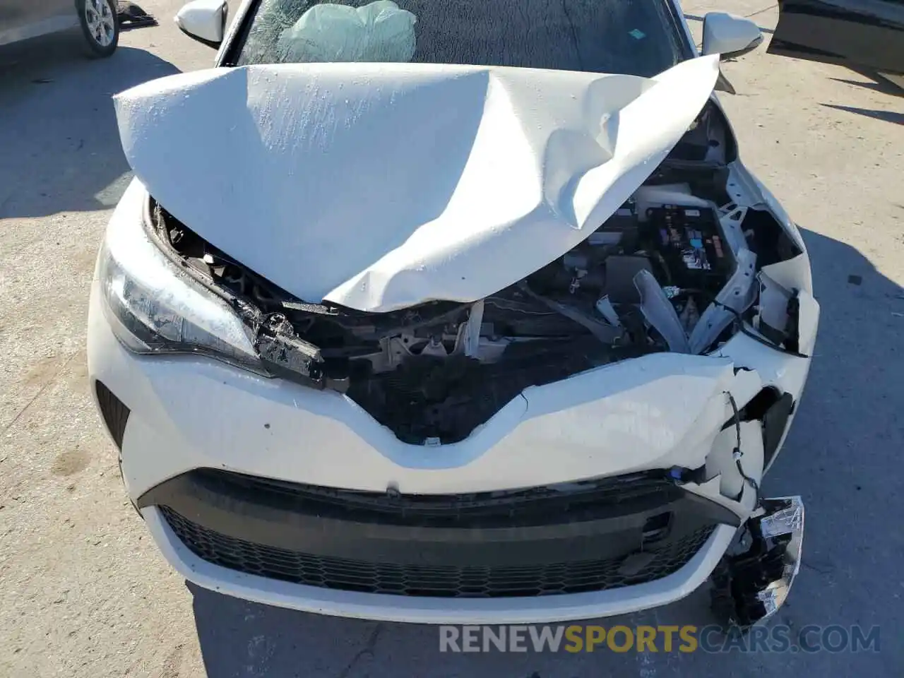 12 Photograph of a damaged car NMTKHMBX7MR129471 TOYOTA C-HR 2021