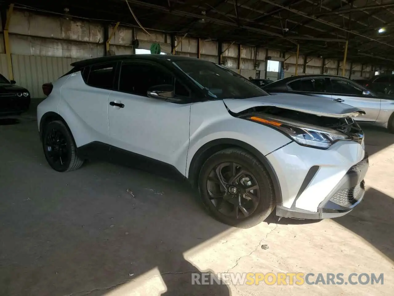 4 Photograph of a damaged car JTNKHMBX3N1129656 TOYOTA C-HR 2022